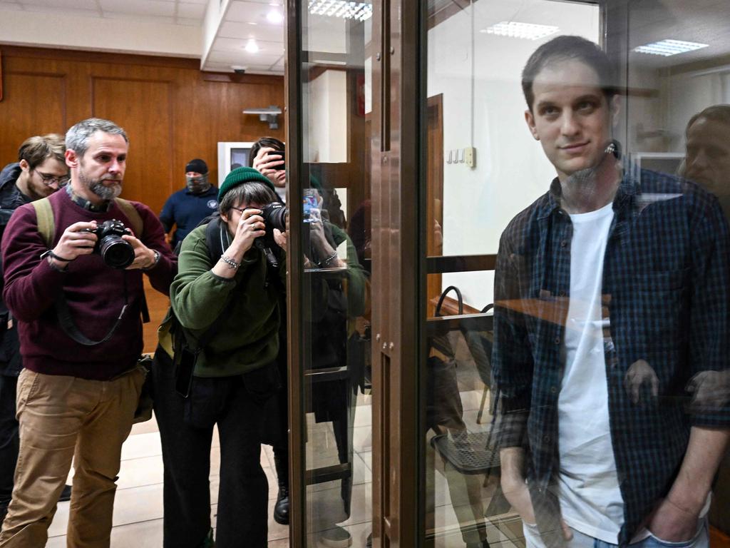 Detained Wall Street Journal journalist Evan Gershkovich, stands inside a defendants' cage before a hearing to consider an appeal on his extended pre-trial detention at the Moscow City Court in Russia on October 10. Picture: Natalia Kolesnikova/AFP