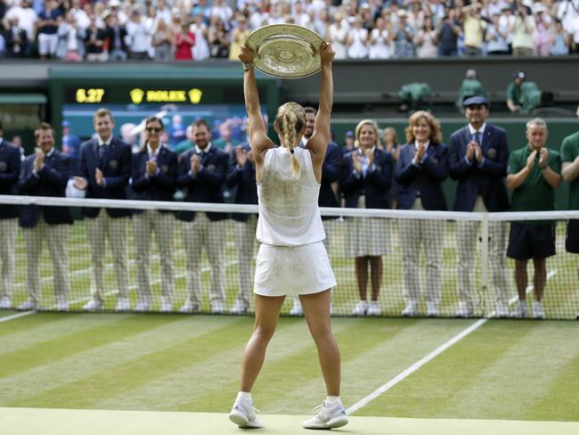 Angelique Kerber lifts the Wimbledon trophy. Picture: AP