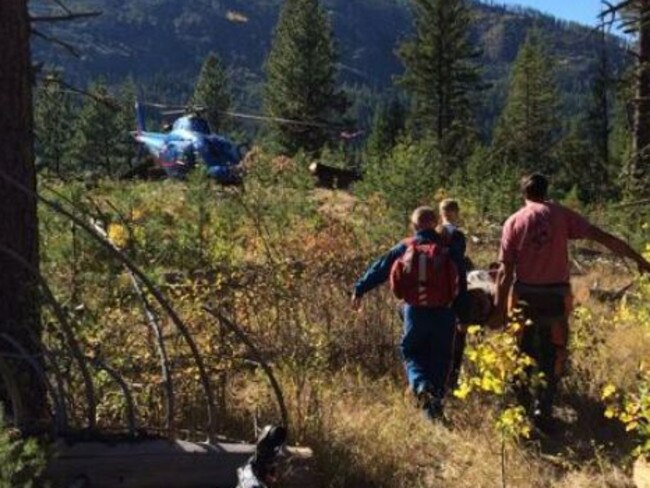 Saved ... Mr Sain being stretchered to a waiting helicopter. Picture: Facebook/Jennifer Sain