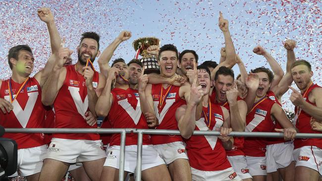 North Adelaide players celebrate after winning last year’s grand final at Adelaide Oval. Picture SARAH REED