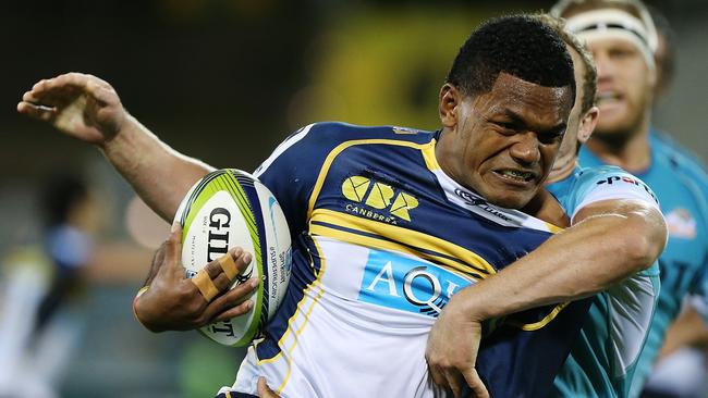 Henry Speight of the Brumbies is tackled.