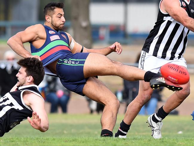 EDFL footy: Northern Saints v Moonee Valley. (L-R) Moonee Valley's Richard Potter (21), Saints Mohamed Taleb (15) and Moonee Valley's Corey McGrath (10). Picture: Josie Hayden