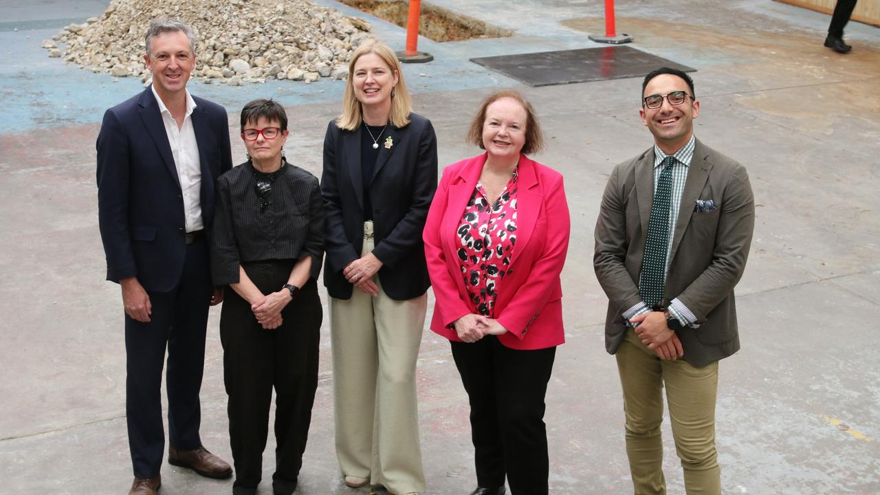 St Vincent de Paul Housing Australia CEO Graham West, Homes Tasmania CEO Eleri Morgan-Thomas, Federal member for Franklin Julie Collins, Senator Carol Brown and member for Clark Simon Behrakis at the former Vinnies shop now the site of the 38 apartment development on Argyle St. Picture: Elise Kaine