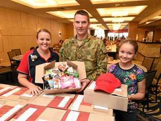 Communities are getting together packing care packages for overseas defence force personnel for Christmas. Picture: Alistair Brightman