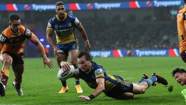 Clint Gutherson dives over to score his first try. Picture: Brett Costello