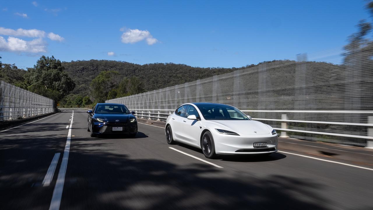 Tesla Model 3 and Toyota Camry Hybrid. Photo: Camber Collective