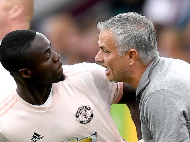 BURNLEY, ENGLAND - SEPTEMBER 02:  Jose Mourinho, Manager of Manchester United in discussion with Eric Bailly of Manchester United as he replaces Paul Pogba of Manchester United during the Premier League match between Burnley FC and Manchester United at Turf Moor on September 2, 2018 in Burnley, United Kingdom.  (Photo by Shaun Botterill/Getty Images)