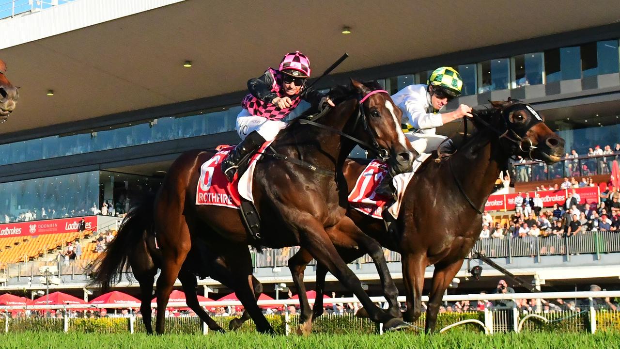 Champion jockey James McDonald on Sunshine In Paris edges out local hero Rothfire in a thrilling Group 1 Doomben 10,000. Picture: Grant Peters-Trackside Photography.