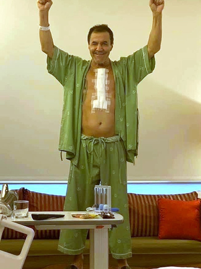 Jeff Fenech gives his victory salute in a Thai hospital after having heart surgery. Picture: Facebook