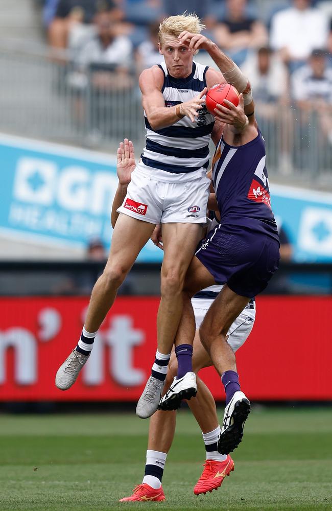 Mitch Knevitt flies to take a mark. Picture: Michael Willson/AFL Photos via Getty Images