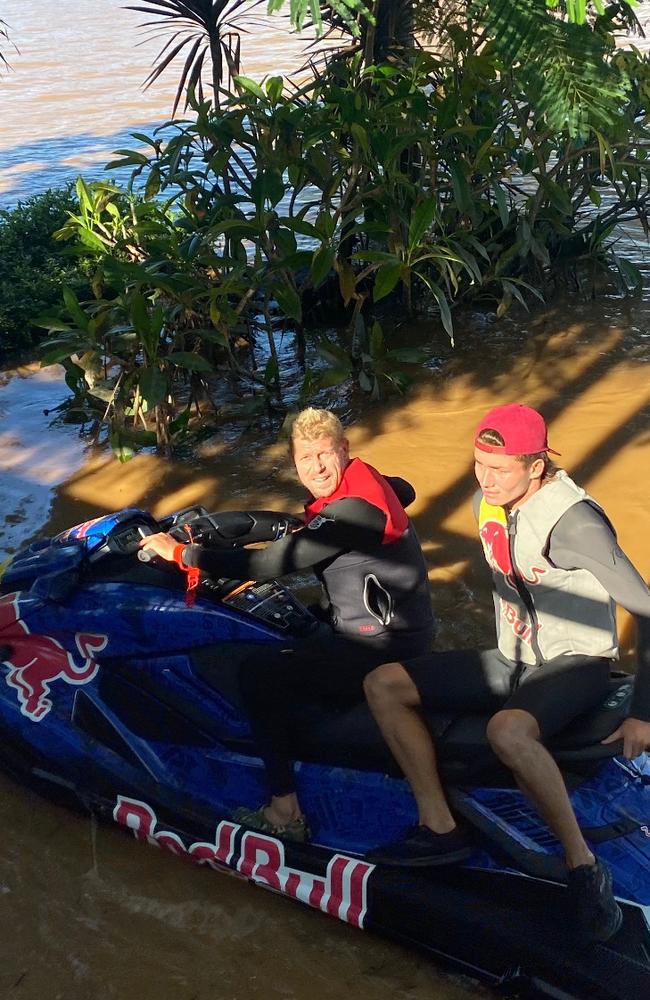 Surfing legends Joel Parkinson and Mick Fanning have been out rescuing flood victims in northern NSW.