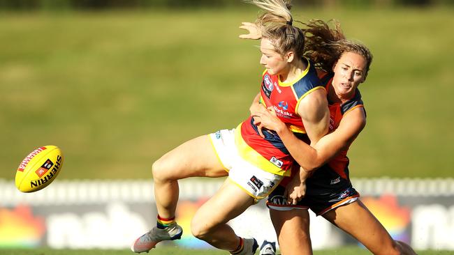 Ailish Considine is tackled by Tarni Evans during their match in Sydney.