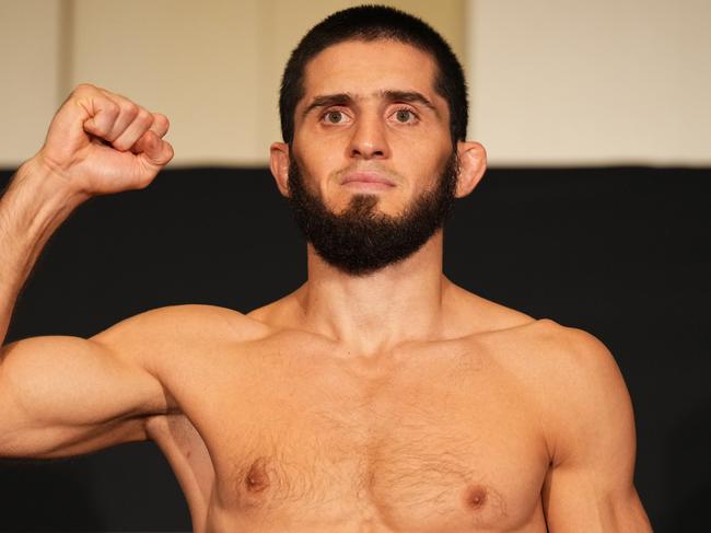 ABU DHABI, UNITED ARAB EMIRATES - OCTOBER 21: Islam Makhachev of Russia poses on the scale during the UFC 280 official weigh-in at Crowne Plaza Yas Island on October 21, 2022 in Abu Dhabi, United Arab Emirates. (Photo by Chris Unger/Zuffa LLC)