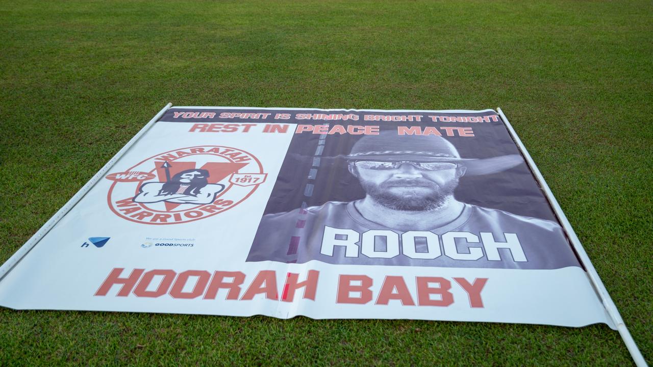 The Waratahs pay tribute to late, great ruckman Alexander ‘Rooch’ Aurrichio at the first game under lights at Gardens Oval. Picture: Aaron Black/AFLNT Media