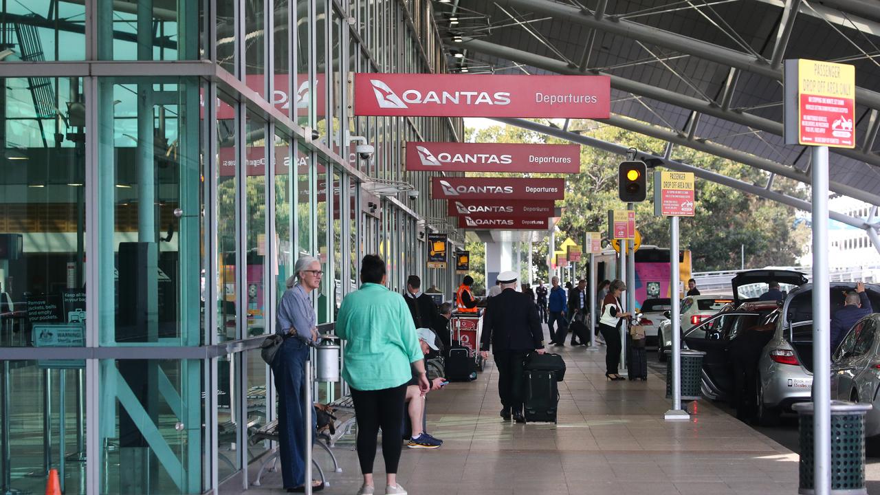 Sydney international terminal arrivals and domestic terminal 3 departures are listed as exposure sites. NCA Newswire / Gaye Gerard