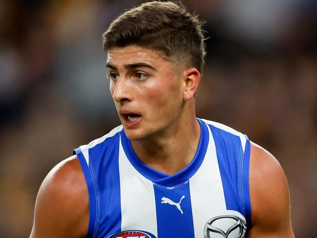 MELBOURNE, AUSTRALIA - APRIL 21: Harry Sheezel of the Kangaroos in action during the 2024 AFL Round 06 match between the North Melbourne Kangaroos and the Hawthorn Hawks at Marvel Stadium on April 21, 2024 in Melbourne, Australia. (Photo by Dylan Burns/AFL Photos via Getty Images)