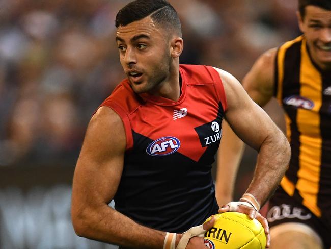 Christian Salem of the Demons (left) and Ryan Burton of the Hawks contest during the First Semi Final between the Hawthorn Hawks and the Melbourne Demons in Week 2 of the AFL Finals Series at the MCG in Melbourne, Friday, September 14, 2018. (AAP Image/Julian Smith) NO ARCHIVING, EDITORIAL USE ONLY