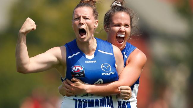 Brittany Gibson celebrates a goal with Emma Kearney.