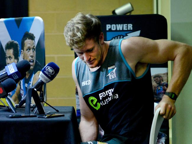 Tom Jonas leaves his press conference Monday after apologising. Photo: Mark Brake