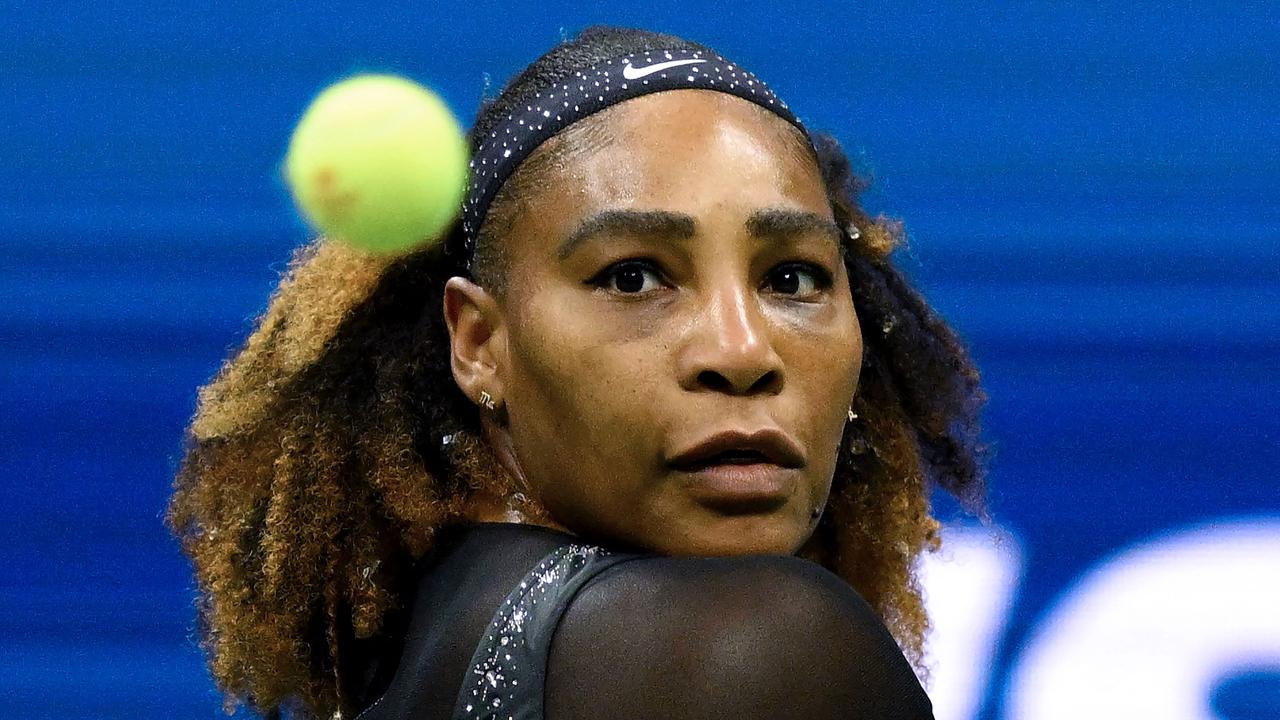 Serena Williams eyes the ball. Photo by ANGELA WEISS / AFP