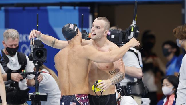 Australia’s Kyle Chalmers (right) congratulates Caeleb Dressel after their 100m freestyle battle at the Tokyo Olympic Games won by Dressel. Picture: Alex Coppel.