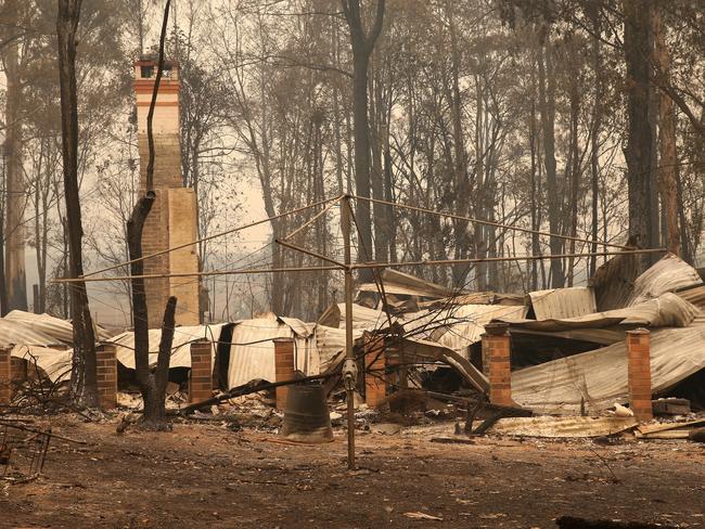 The leveled houses right next door to Jenny and Dean Aqualina who had their house severely damaged in the fires. Picture: Peter Lorimer