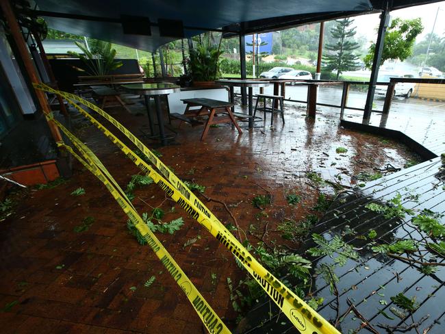 Debris caused by Cyclone Debbie’s strong winds in the streets of Airlie Beach. Picture: Liam Kidston.