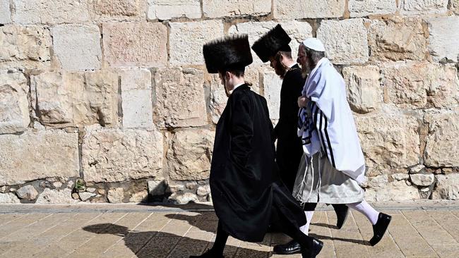 A group of ultra-orthodox Jewish men walk near the walls of Jerusalem's Old City. I suspect Christian anti-Semitism has something to do with anxiety that flowed from the fact of Jewish origins and creation. Picture: AFP