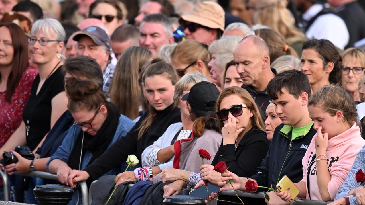 There were plenty of tears and bowed heads in the crowd. Picture: Leon Neal/Getty Images