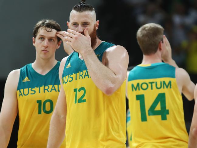 RIO DE JANEIRO, BRAZIL - AUGUST 10: Cameron Bairstow #10, Aron Baynes #12, Brock Motum #14 and Matthew Dellavedova #8 of Australia react after being defeated during the Men's Preliminary Round Group A between Australia and the United States on Day 5 of the Rio 2016 Olympic Games at Carioca Arena 1 on August 10, 2016 in Rio de Janeiro, Brazil. (Photo by Phil Walter/Getty Images)