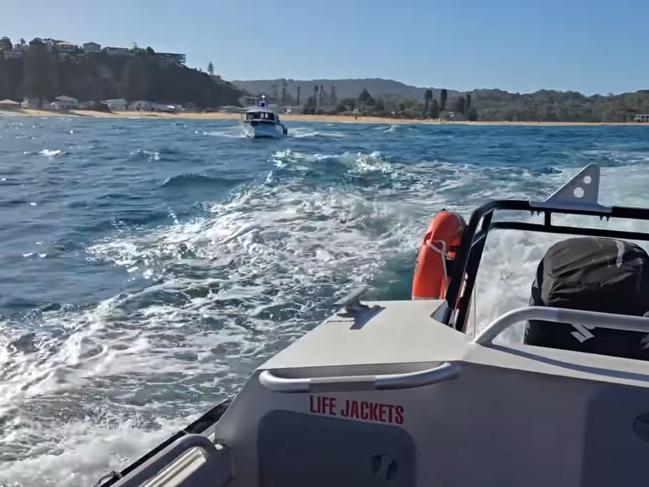 The two other friends were able to get out of the water but the 15-year-old has not been rescued as of yet. Picture: Marine Rescue NSW