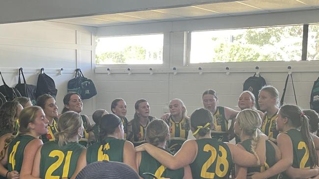 Maroochydore Roos celebrate in the shed.