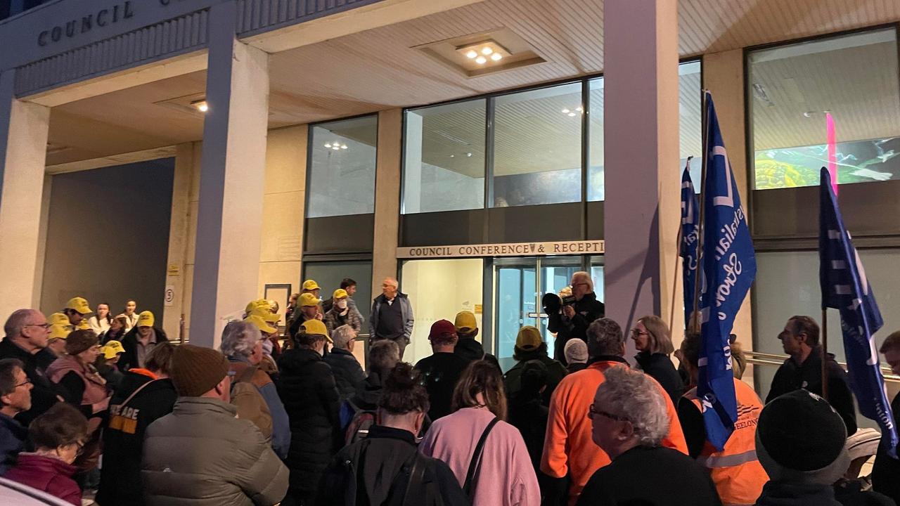 Protesters outside City of Greater Geelong Council chambers (May 23, 2023). Members of the Save Barwon Heads Library group in yellow hats.