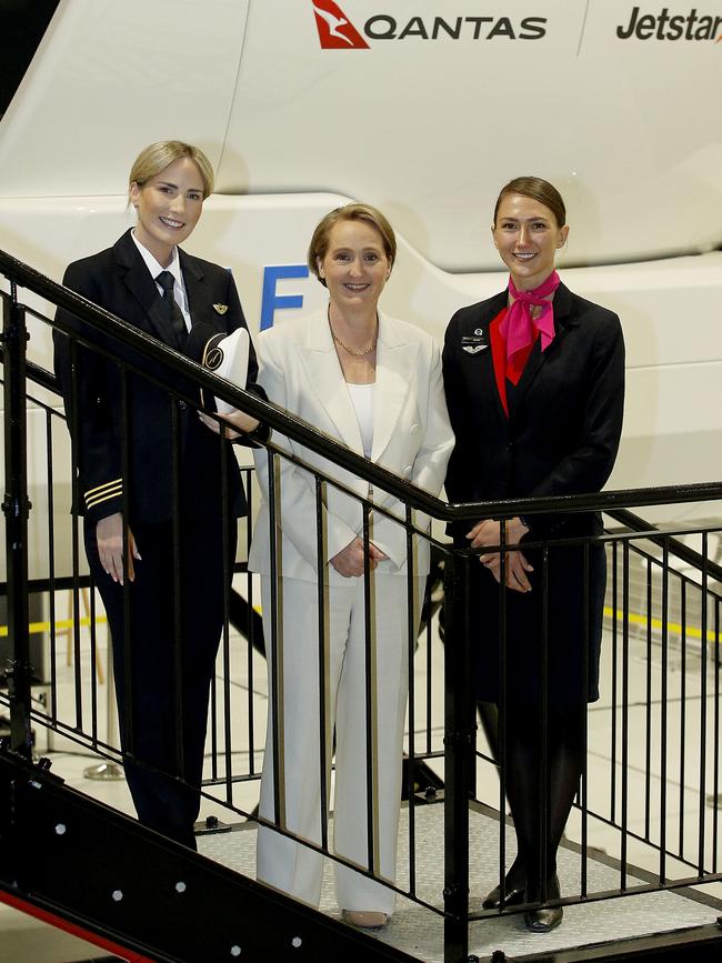 Qantas CEO Vanessa Hudson, centre, with first officer Lauren MacLean, left, and flight attendant Anna Shevel at the Sydney flight training centre. Picture: NewsWire / John Appleyard