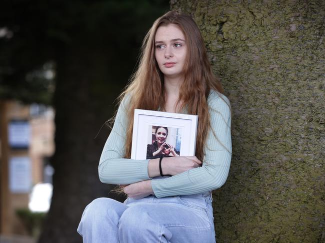 Demi Trinca with a photo of her sister Bekkie-Rae. Picture: David Caird