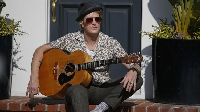 The Living End frontman Chris Cheney plays a newly written song, Keep Your F..kin’ Distance, for Review’s Isolation Room – a video series starring top musicians and artistic performers recorded at their homes. Picture: Danny Moloshok / The Australian, April 2020.