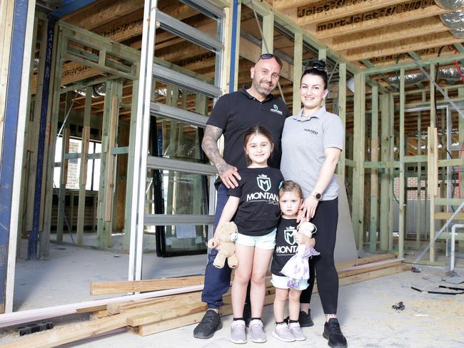 Enzo and Asude Montana, with their children Allegra and Aletta in their new house. Picture: Christian Gilles