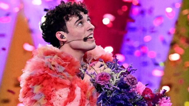 Swiss singer Nemo representing Switzerland with the song "The Code" celebrates on stage after winning the final of the 68th Eurovision Song Contest (ESC) 2024 on May 11, 2024 at the Malmo Arena in Malmo, Sweden. (Photo by Tobias SCHWARZ / AFP)