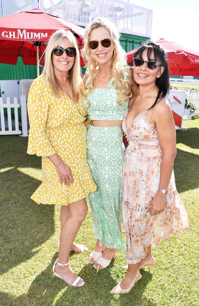 Julie Daniec, Michele Adamson and Prina Walters at Ladies Oaks Day, Caloundra. Picture: Patrick Woods.