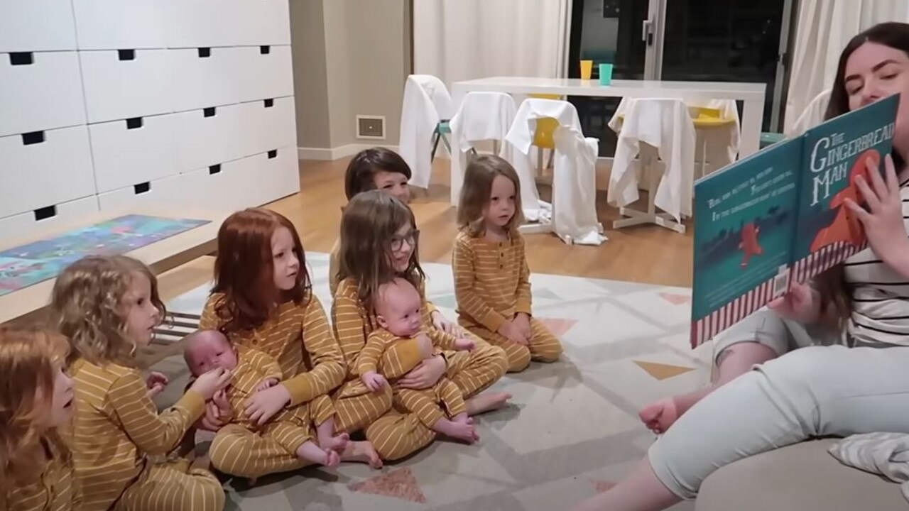 After she finishes bathing and feeding the newborns, she reads the kids a bedtime story. Picture: YouTube