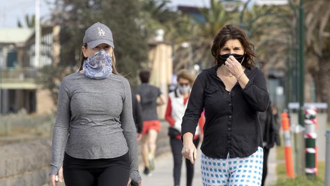 Melburnians have endured compulsory masks since early August. Picture: NCA NewsWire / David Geraghty