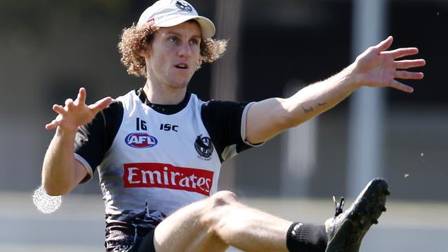 Collingwood training at Olympic Park. Chris Mayne kicks at goal . Pic: Michael Klein