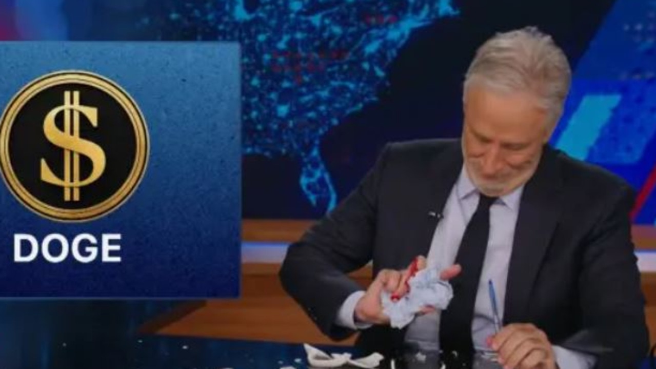 Stewart grimaced as he looked at his hand, which he quickly pulled away to hide under his desk. Picture: The Daily Show