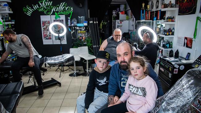 Dylan Glacken, owner of Ink in Skin Tattoo studio with his kids Chloe, 5 and Blake, 7. Picture: Tom Huntley