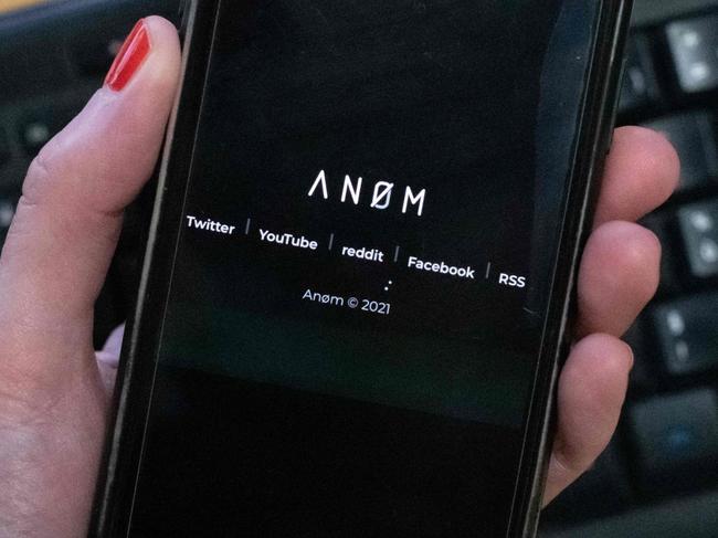 The ANoM app appears on the screen of a smartphone in Paris, on June 8, 2021. - Some 250 people were arrested in Sweden and Finland in the global sting on organised crime, authorities said on June 8, 2021, using phones planted by the US FBI, law enforcement officers were able to read the messages of global underworld figures in around 100 countries as they plotted drug deals, arms transfers and gangland hits on the compromised ANOM devices. (Photo by Olivier MORIN / AFP)