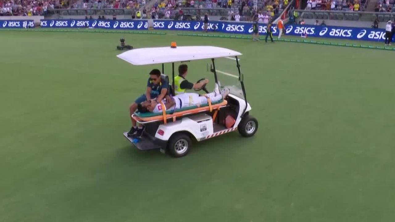 Dimuth Karunaratne was stretchered off after being struck by a Pat Cummins bouncer.