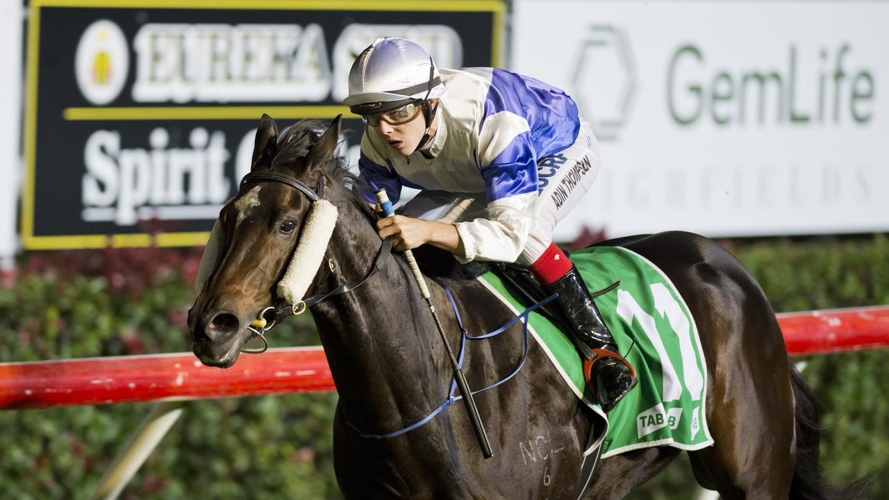 Toowoomba mare Okanagan Miss and apprentice Adin Thompson winning at Clifford Park last season. She'll chase a return to the winner's list tomorrow. Picture: Nev Madsen