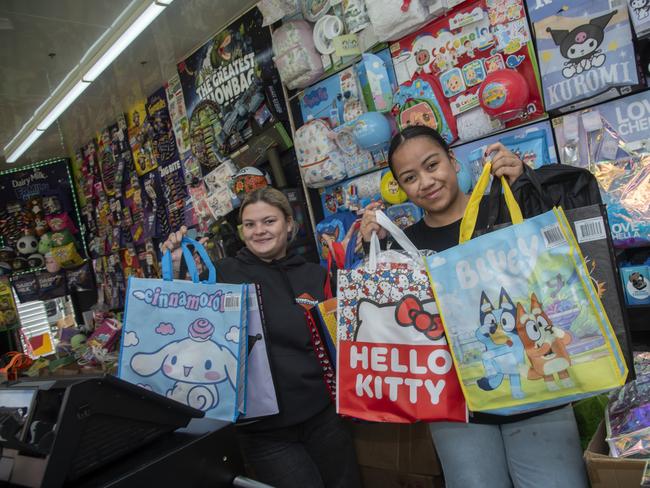 Charlee Andersen, Sina Taruia working a showbag stall at the Mildura Show 2024. Picture: Noel Fisher