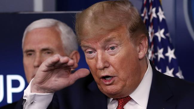 President Donald Trump outlines his blueprint, as Vice President Mike Pence listens. Picture: Alex Brandon/AP