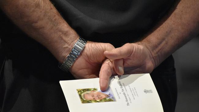 More than 300 mourners gathered at the MECC to watch the live streamed State funeral service for Tim Mulherin on Tuesday September 15 in Mackay. Picture: Zizi Averill